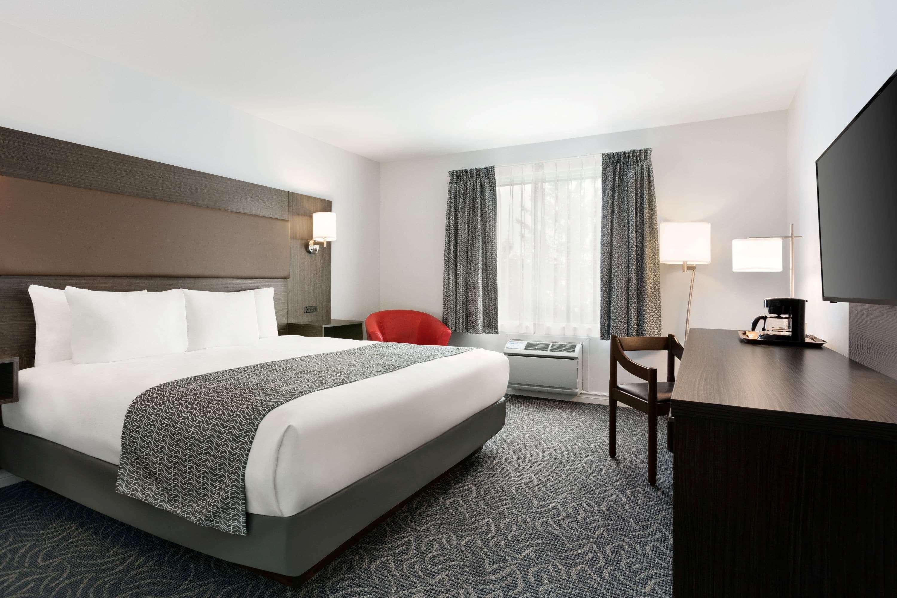 Travelodge By Wyndham Rigaud Exterior photo